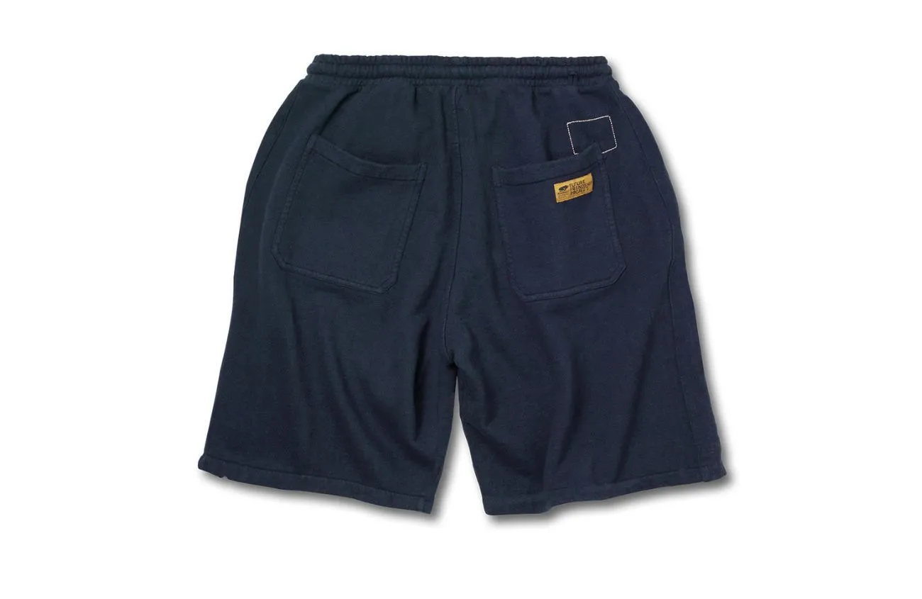 KARHU X UNIVERSAL WORKS TRACK SHORT - NAVY